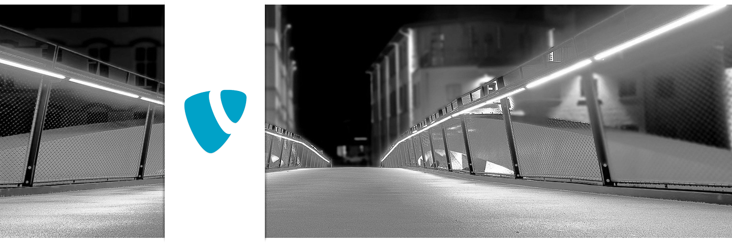 Nachtaufnahme einer Fußgängerbrücke in Lüdenscheid – Symbol für moderne TYPO3 Websites